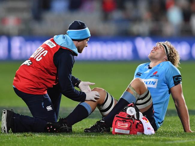 CHRISTCHURCH, NEW ZEALAND - MAY 12:  Ned Hanigan of the Waratahs receives medical help during the round 12 Super Rugby match between the Crusaders and the Waratahs at AMI Stadium on May 12, 2018 in Christchurch, New Zealand.  (Photo by Kai Schwoerer/Getty Images)