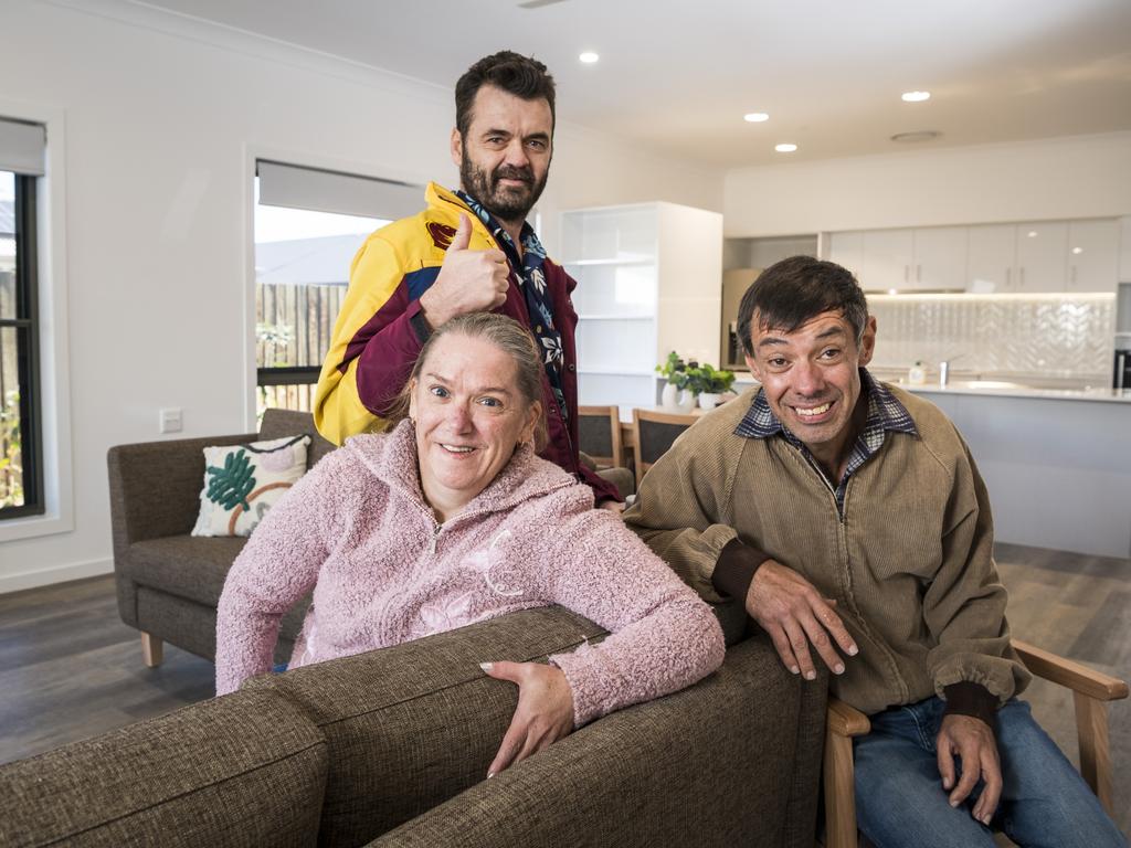 Annamaree Maguire, Scott Craig and Scott McNalty (right )check out their future home, part of the My Home, My Life accessible homes initiative of the Endeavour Foundation. Picture: Kevin Farmer