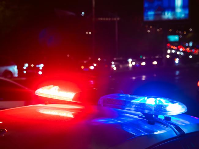 police car in night light street