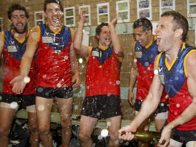 Happier times: Parkdale Vultures celebrate a premiership win in 2011.