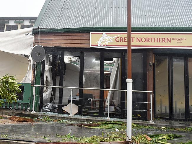 Shops have been trashed on the main street of Airlie during Cyclone Debbie. Picture: Alix Sweeney