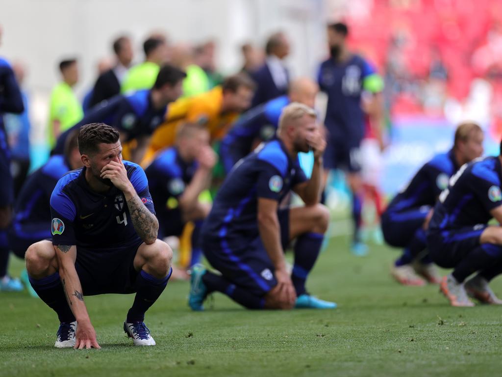 Finland’s players look dejected.