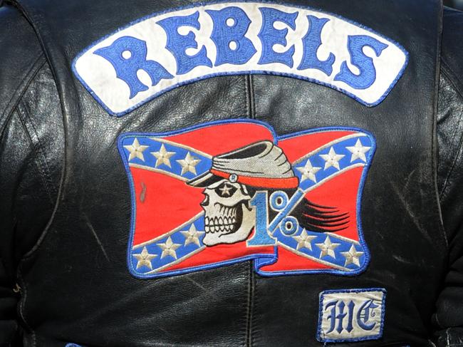 ** FILE ** A June 13, 2009 file photo of a member of the Rebels MC at Moore, Sydney. The High Court has declared as unconstitutional South Australia's controversial bikie laws banning members from associating Thursday, Nov. 11, 2010. (AAP Image/Dean Lewins, Files) NO ARCHIVING