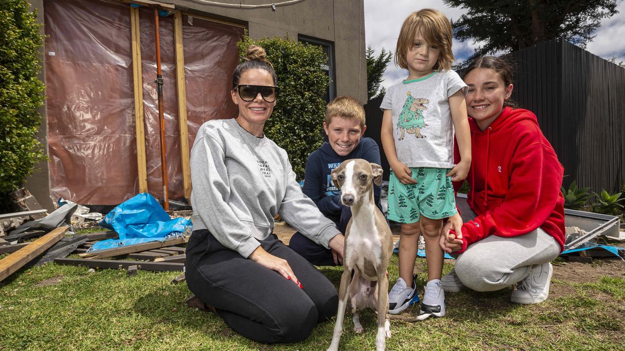 Kyley, Levi, Noah and Bella Bugeja with their dog Vic after he was found outside the Kingston City Town Hall. Picture: NCA NewsWire / Daniel Pockett