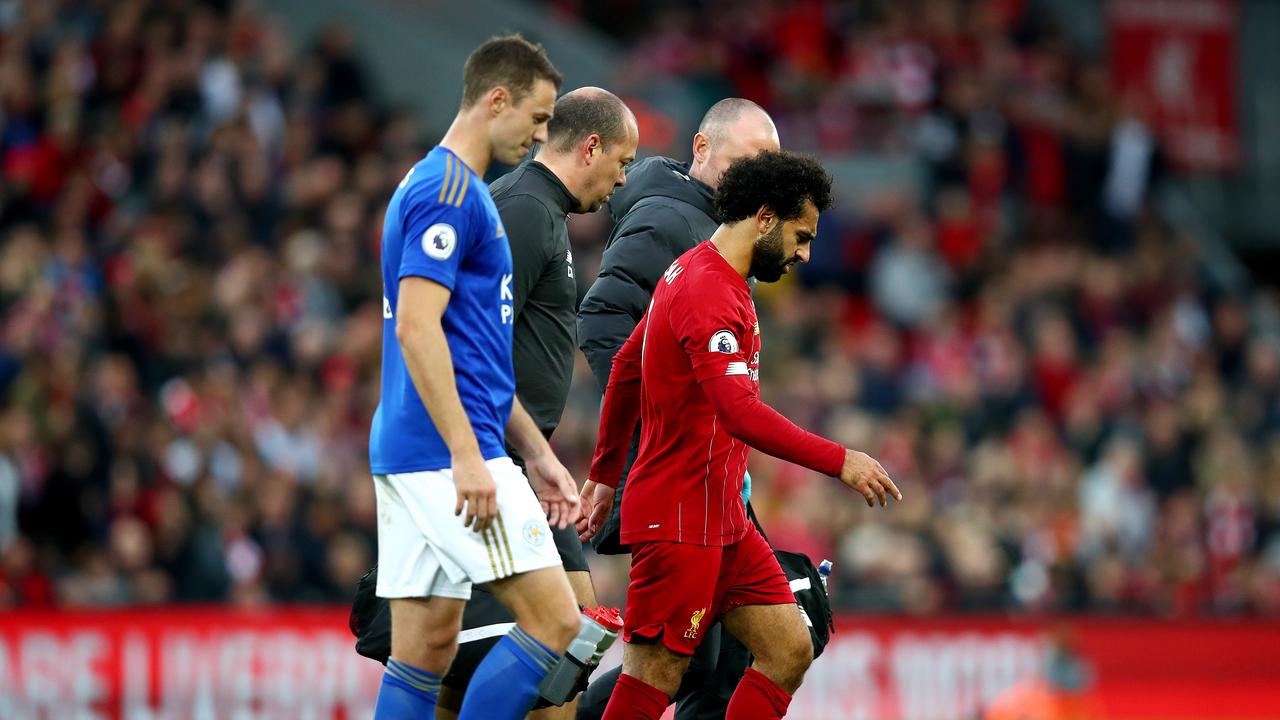 Mohamed Salah limped off in stoppage time. (Photo by Clive Brunskill/Getty Images)