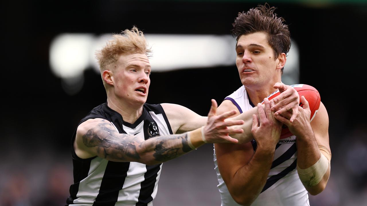 Lachie Schultz of the Dockers out marks John Noble of the Magpies during the 2nd qtr. . Pic: Michael Klein