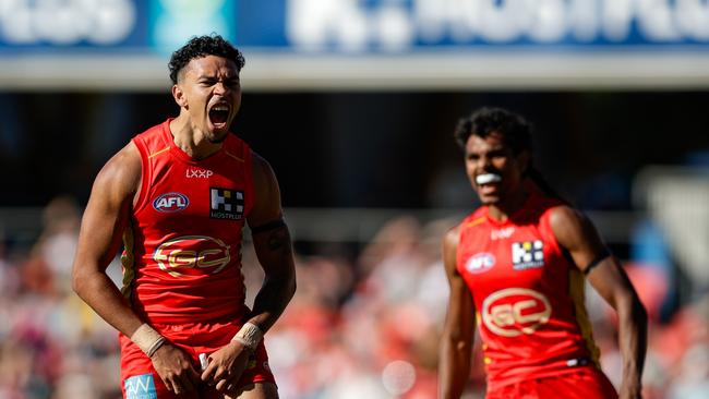 Malcolm Rosas of the Suns celebrates a goal. (Photo by Russell Freeman/AFL Photos via Getty Images)