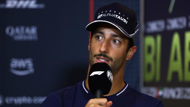 ABU DHABI, UNITED ARAB EMIRATES - NOVEMBER 23: Daniel Ricciardo of Australia and Scuderia AlphaTauri attends the Drivers Press Conference during previews ahead of the F1 Grand Prix of Abu Dhabi at Yas Marina Circuit on November 23, 2023 in Abu Dhabi, United Arab Emirates. (Photo by Clive Rose/Getty Images)