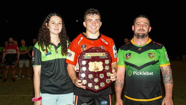 Litchfield captain Trent Wedding received the Mitchell Russell Shield from it’s namesake’s sibling Jaymie and David Russell after winning Round 5 of the 2023 NRL NT premiership. Picture: Palmerston Raiders