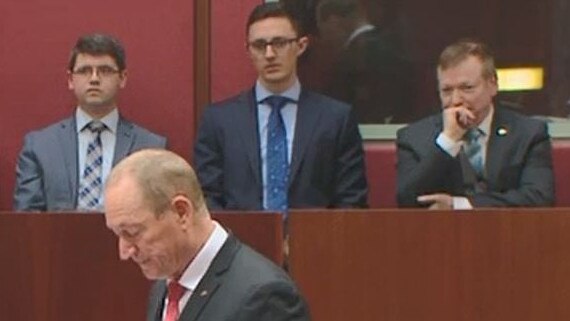 Fraser Anning adviser Richard McGilvray, top centre, during the senator’s maiden speech on Tuesday night.