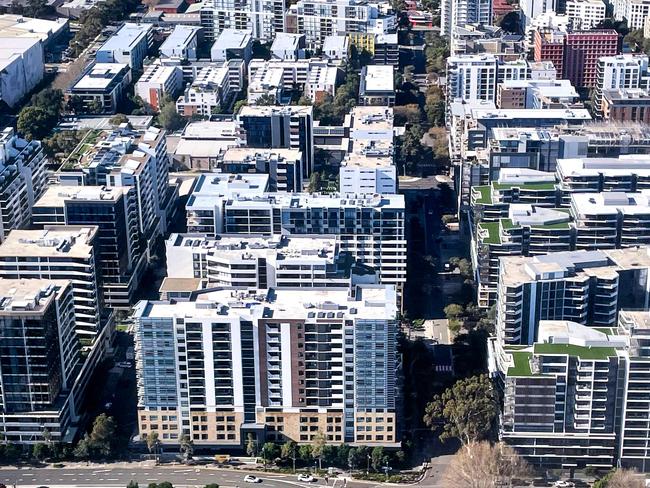 A photo taken on June 16, 2024 shows an aerial view of newly constructed apartment blocks located in the Sydney suburb of Mascot. (Photo by DAVID GRAY / AFP)