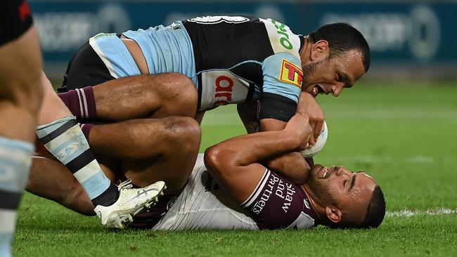 Will Chambers tangles with Manly's Dylan Walker  Picture: NRL photos