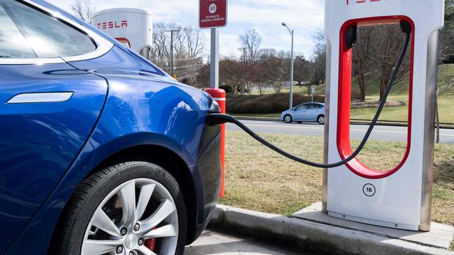 Climate Change and Energy Minister Chris Bowen wants Australians to be able to use their EVs to charge their homes in the next year or so. Picture: AFP