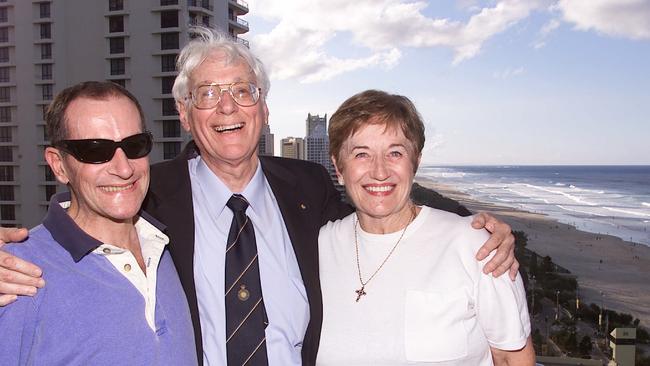 2001. Dr John Knight (aka Dr James Wright) with Joan and Peter Taylor who he helped through his charity.