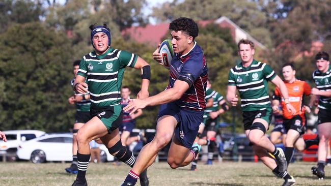 Jojo Fifita of TSS runs with the ball against BBC during their GPS Rugby clash. Photograph: Jason O'Brien