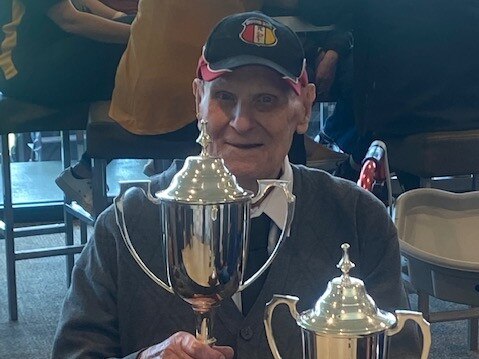 Colin ‘Tiny’ Nelson with some of Goodwood’s many premiership trophies. His desire of success stayed with him until his passing. Picture: Goodwood Football Club