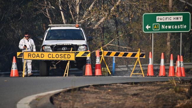 Authorities closed roads in Northern NSW because of bushfire danger in November 2019. (Photo by Peter Parks / AFP)