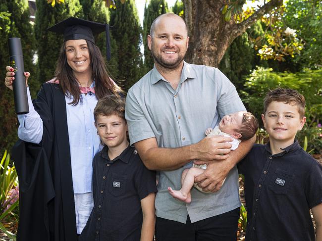 Master of Education (Guidance and Counselling) graduate Kirsten Doecke with husband Matt Doecke and their kids baby Ash, Taj and Jax (right) at a UniSQ graduation ceremony at The Empire, Tuesday, October 29, 2024. Picture: Kevin Farmer