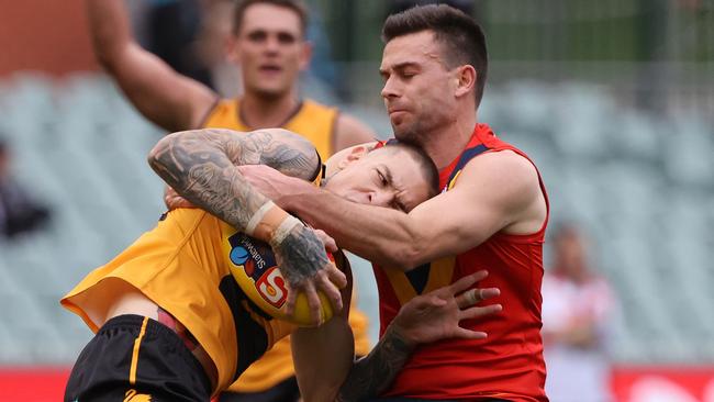 Matt Goldsworthy, of SA, tackles Matt Parker, of WA, during Saturday’s interstate encounter. Picture: SANFL Image/David Mariuz