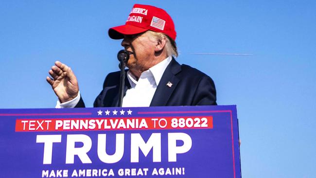 Donald Trump as gunshots are fired at his campaign rally. Picture: New York Times/Headpress