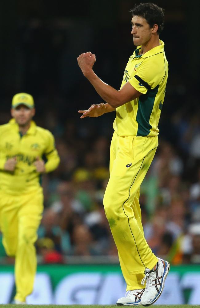 Starc celebrates taking a wicket against Sri Lanka.