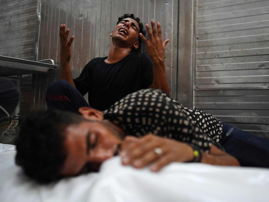 The war in the Middle East has made headlines all year. In this image, Palestinians mourn over the body of a relative killed in an Israeli strike, ahead of their funeral in Khan Yunis, in the southern Gaza Strip, on August 12, 2024. Picture: AFP