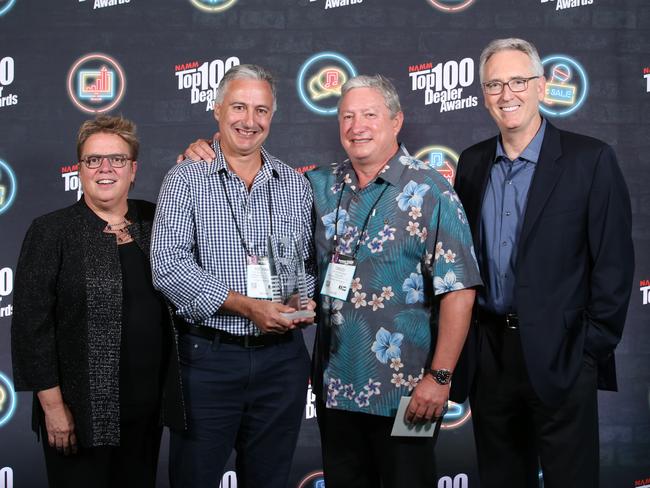 Brothers Richard and David Berkman (centre) with their award. Picture: Supplied