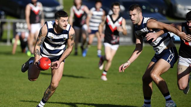 Lachlan Baum with ball. Picture: Andrew Batsch