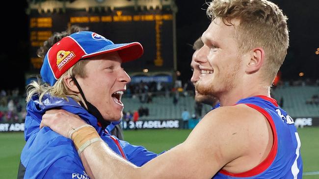 Cody Weightman and Adam Treloar celebrate after the preliminary final.