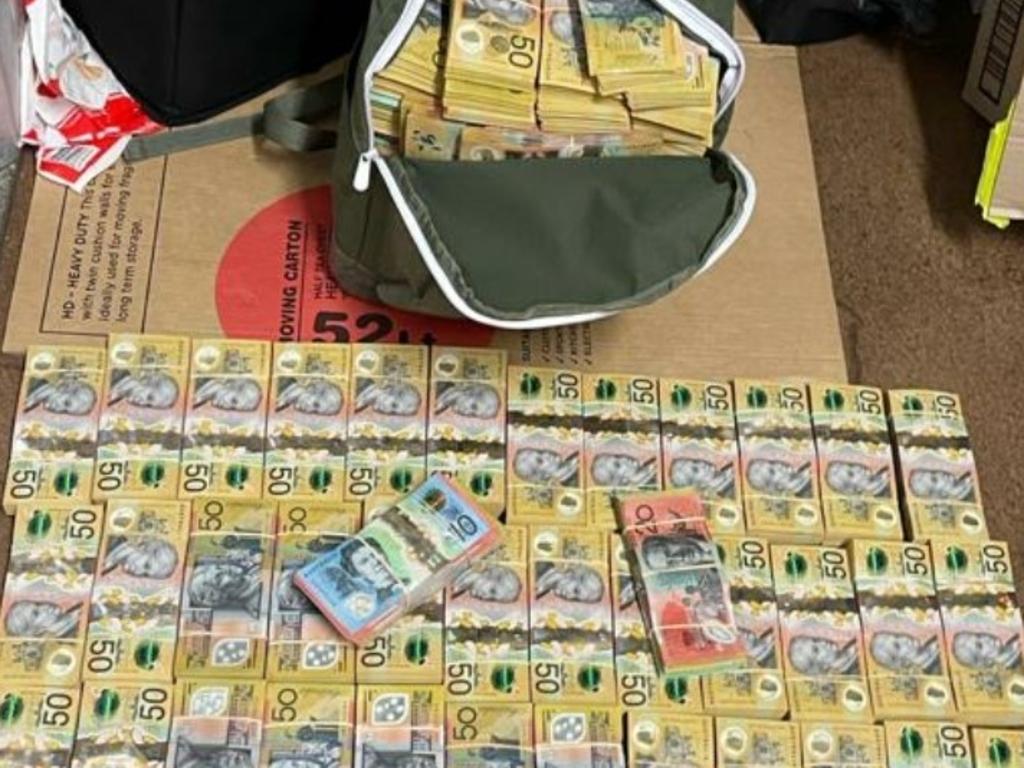 Police have charged 14 men with about 150 drug-related charges after an 18 month operation that allegedly netted $8.5 million in cash and weapons. Picture: Queensland Police