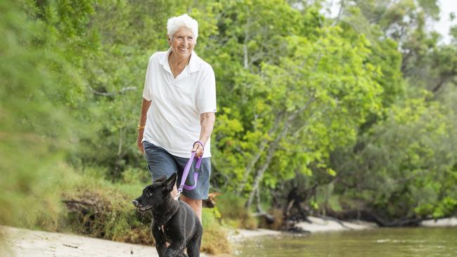 Finding peace: Dawn Fraser, 83, takes time out with Coco. “I just wanted to be happy, like an ordinary family.” Picture: Lachie Millard.