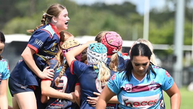 Harvey 19s girls Clydesdales celebrate a try.