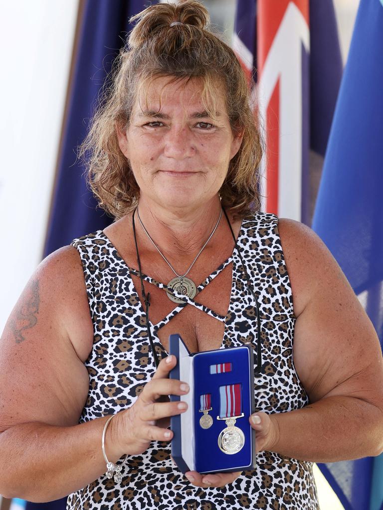 Widow Kerry Dare with a Posthumous Bravery Medal for her late husband, Alan Dare.