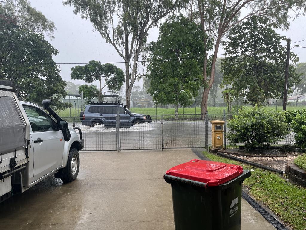 Eric Haughton, a resident of Forth St in South Mackay, had water lapping at his garage door at 6.30am on February 4, 2025. When cars drive through at speed his property gets slapped with water. Photo taken at 9am. Picture: Luke Lay