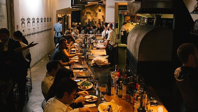 Diners at Burnt Ends restaurant in Chinatown.