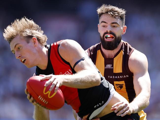 The Dons and Hawks fight it out in round 1. Picture: Michael Klein