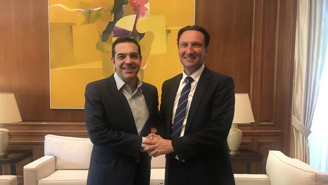 Greece Prime Minister Alexis Tsipras (left) with South Melbourne A-League chairman Bill Papastergiadis this month.