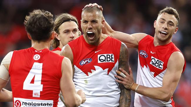 Ever the showman, Sydney's Lance Franklin celebrates kicking a goal during the preliminary final. Picture: Phil Hillyard