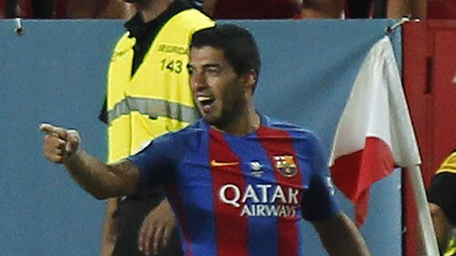 Barcelona's Luis Suarez celebrates after scoring.