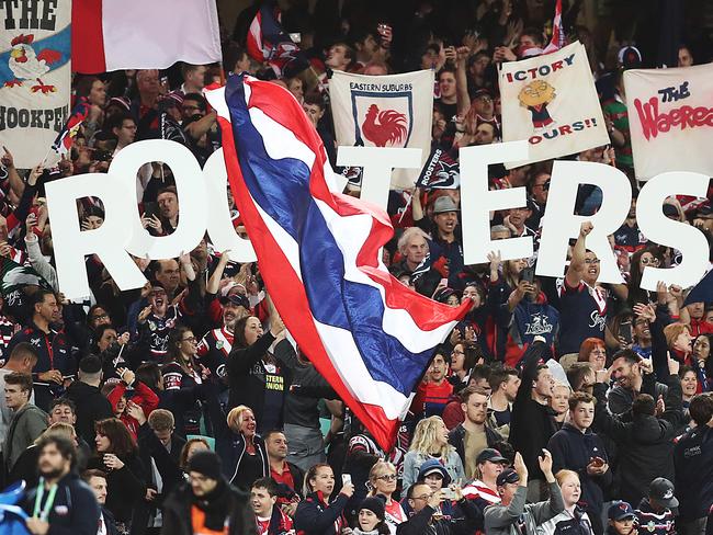 SYDNEY, AUSTRALIA - SEPTEMBER 13: roosters fans celebrate victory during the NRL Qualifying Final match between the Sydney Roosters and the South Sydney Rabbitohs at Sydney Cricket Ground on September 13, 2019 in Sydney, Australia. (Photo by Mark Metcalfe/Getty Images)