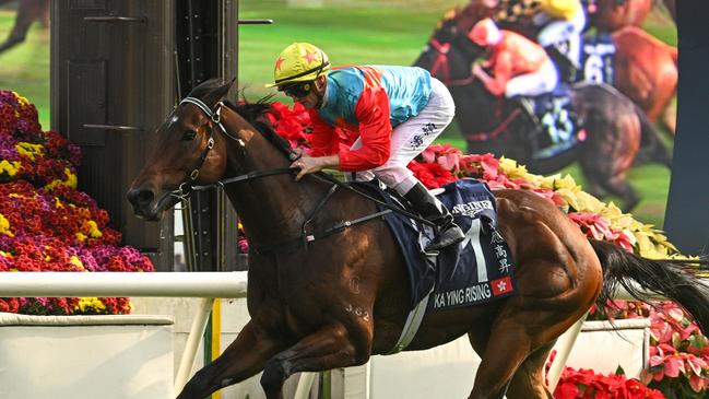 HONG KONG, CHINA - DECEMBER 08: Zac Purton riding Ka Ying Rising winning Race 5, the Longines Hong Kong Sprint during racing at Sha Tin Racecourse on December 08, 2024 in Hong Kong, China.  (Photo by Vince Caligiuri/Getty Images)