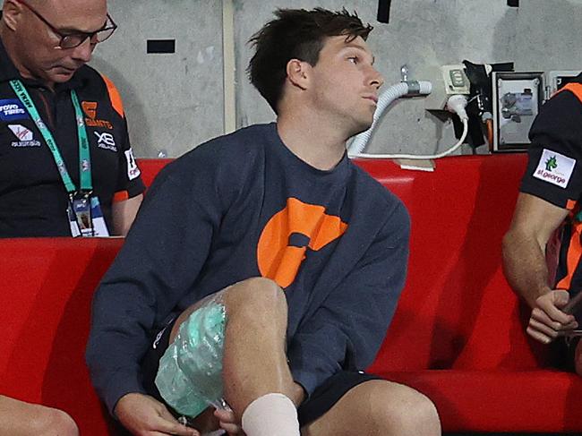 AFL Round 9. Gold Coast Suns vs GWS Giants at Metricon Stadium, Gold Coast.  02/08/2020.    Toby Greene of the Giants takes the ice of his hamstring  . Pic: Michael Klein