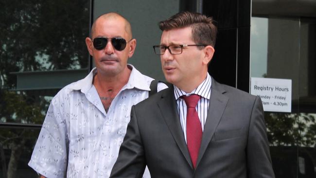 Hylton Miller and solicitor Michael Gatenby leave the Southport Magistrates Court during the trial.