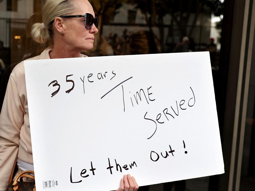 A supporter holds a sign at a press conference with Menendez family members outside the Criminal Courts Building in Los Angeles, California, this month. Picture: Getty Images via AFP