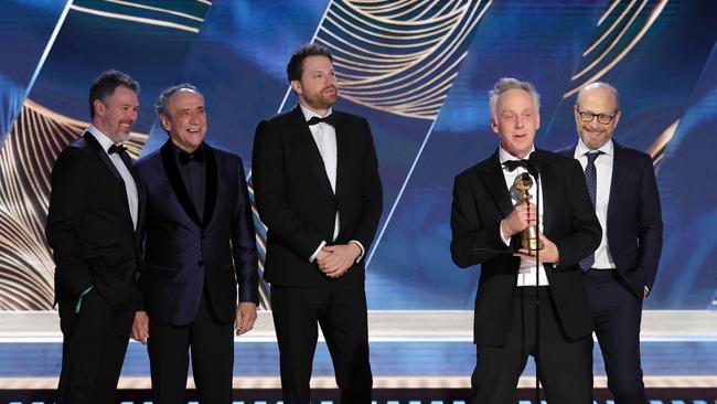 David Bernad, F. Murray Abraham, Nick Hall. Producer, Mike White, and Mark Kamine accept the Best Limited or Anthology Series or Television Film award for "The White Lotus". Picture: AFP