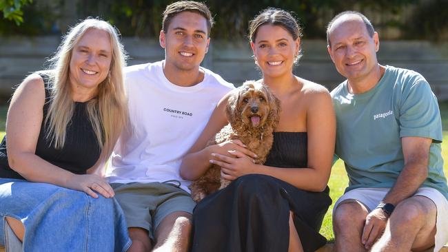 South Adelaide’s Zac Dumesny (second from left), with his mum Nicole, girlfriend Samantha, dad Duane and dog Darcy. Picture: RoyVphotography