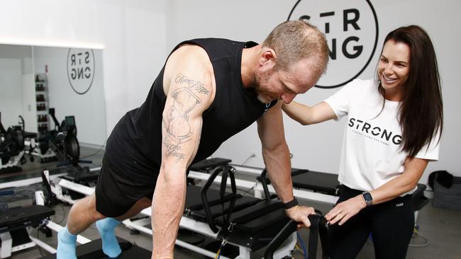 Mel and Dave Willmot are their new Strong Pilates studio in Hope Island. Picture: Tertius Pickard