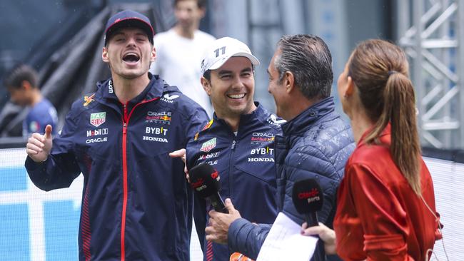 Max Verstappen and Sergio Perez gesture during an interview as part of the activities ahead the F1 Grand Prix of Mexico. Picture: Agustin Cuevas/Getty Images