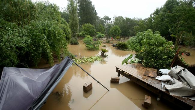 Heavy rain continues to batter the NSW mid north coast causing major flooding. Residents of the small village of Telegraph Point north of Port Macquarie return to their destroyed homes. Krysia Mailo returns to her 114 year old destroyed house with her mother Yvonne Burt. Pic Nathan Edwards