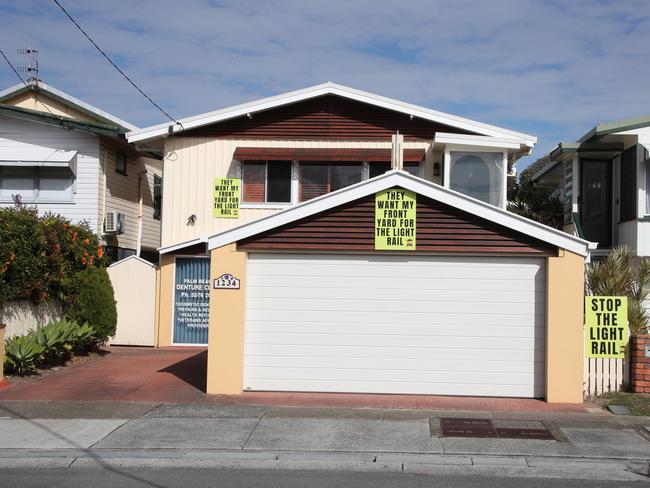 Anti light rail signs on a house in Palm Beach. Picture: Glenn Hampson.